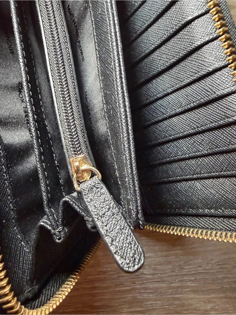 Michael Kors Black Zip-Around Saffiano Wallet with Gold Logo